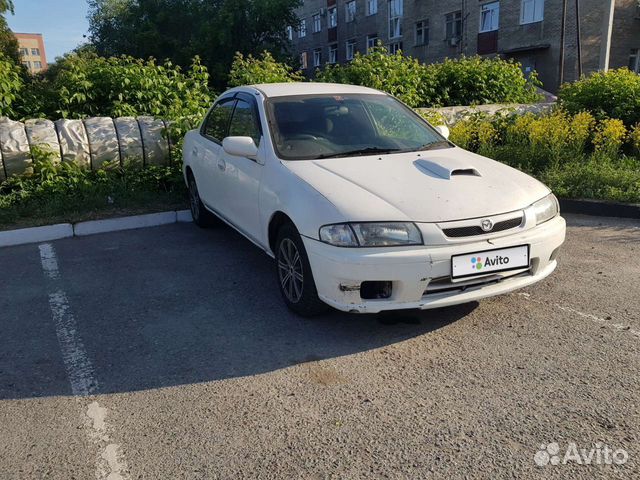 Mazda Familia 1.7 AT, 1997, 15 000 км