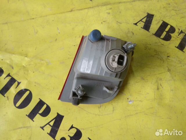 Отражатель в бампер задний левый Toyota Land
