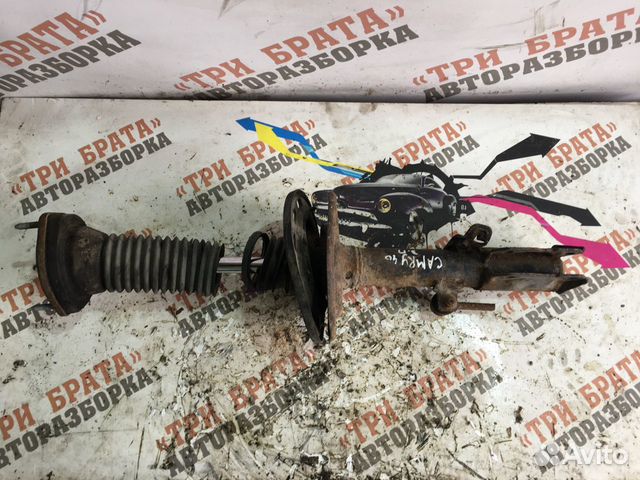 Тойота Камри Амортизатор задний правый