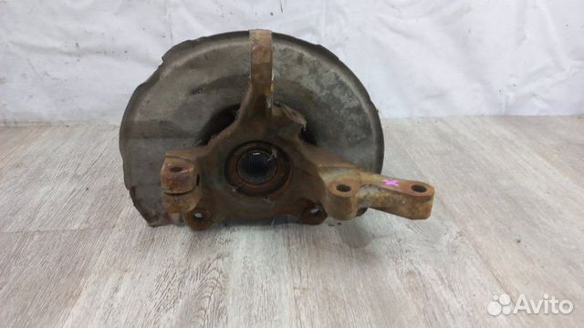 Кулак поворотный передний левый Mitsubishi Lancer