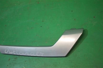 Накладка решетки радиатора левая Mitsubishi