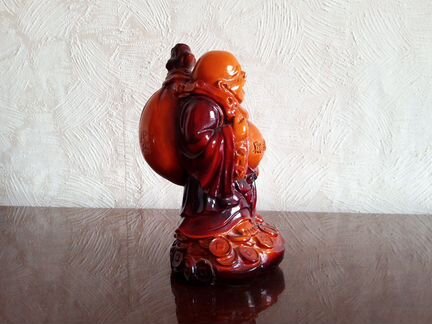 Хотей с мешком на монетах