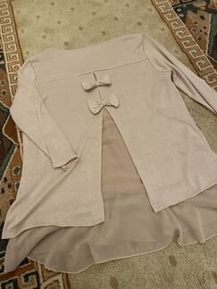 Розовая кофточка с оборкой