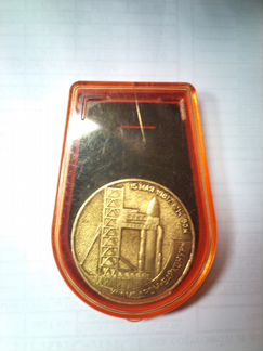 Медальон, выпущенный в честь первого запуска ракет